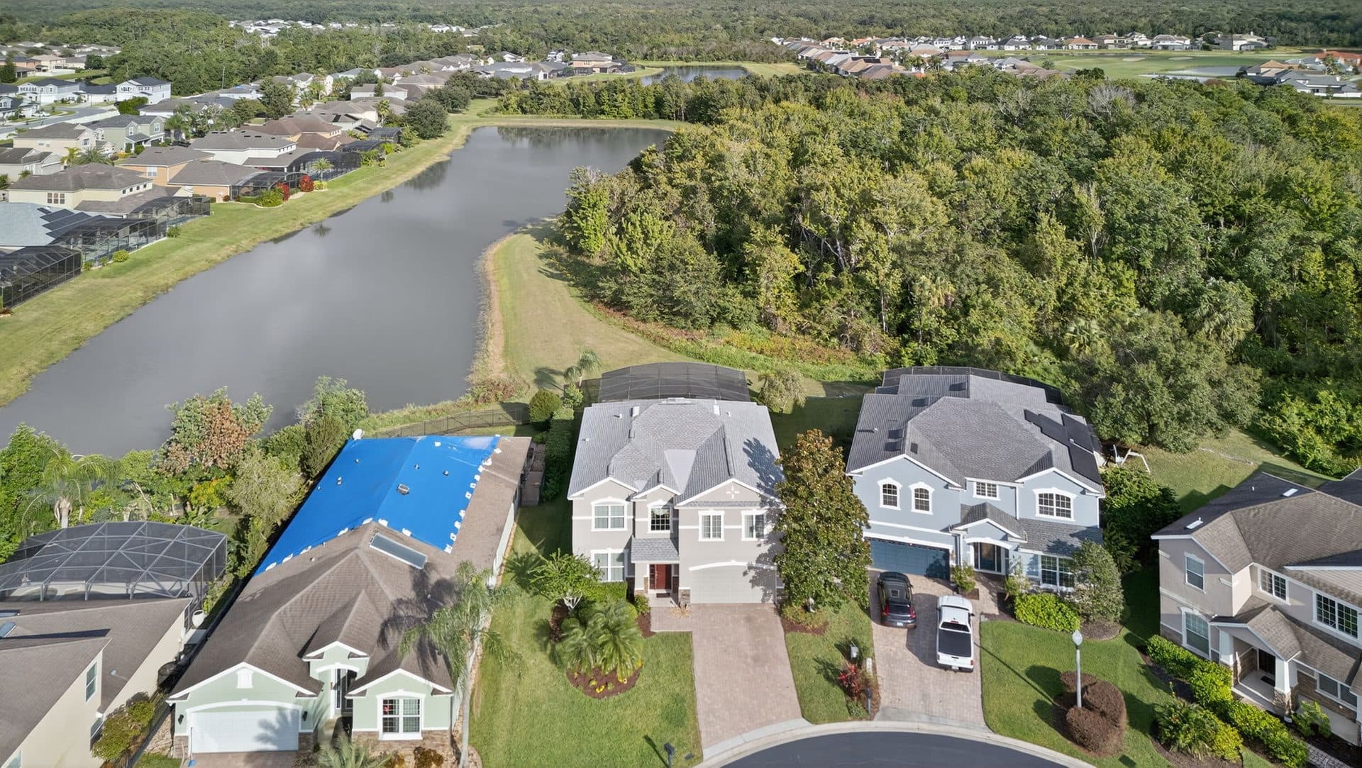 Aerial view of 1432 Brookhaven Ct and the lake behind it