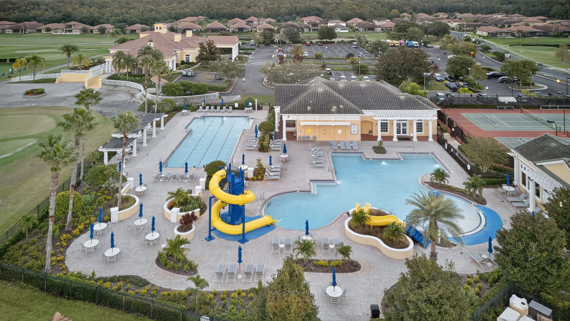 Aerial view of the Providence resort-style pool with water slides beside the clubhouse
